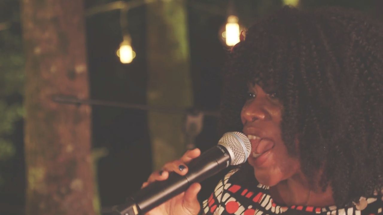 Capital Club Band singer performing Valerie
